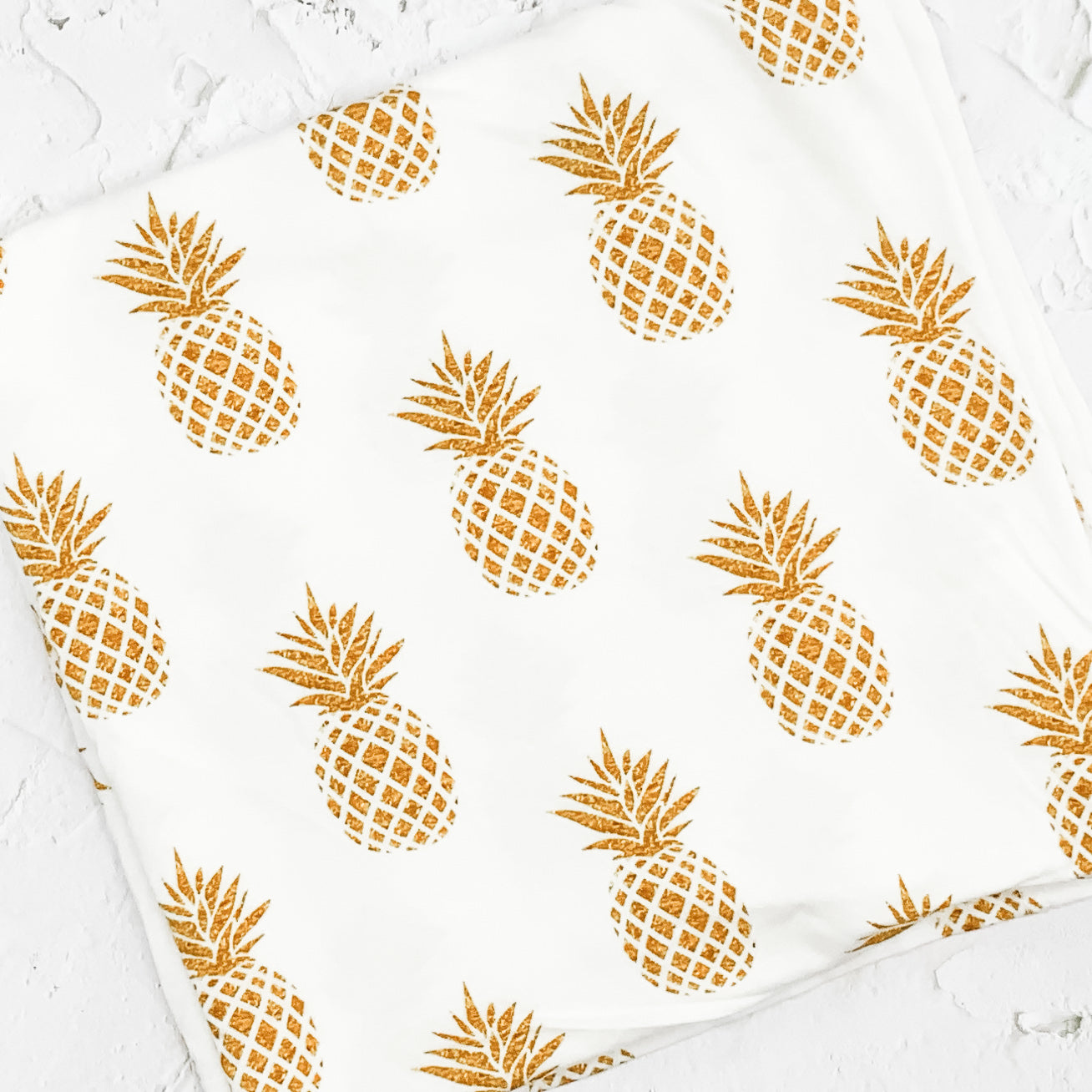 Luxury Stretch Bamboo Swaddle - Golden Pineapples