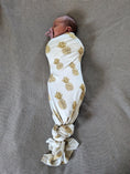 Load image into Gallery viewer, Luxury Stretch Bamboo Swaddle - Golden Pineapples
