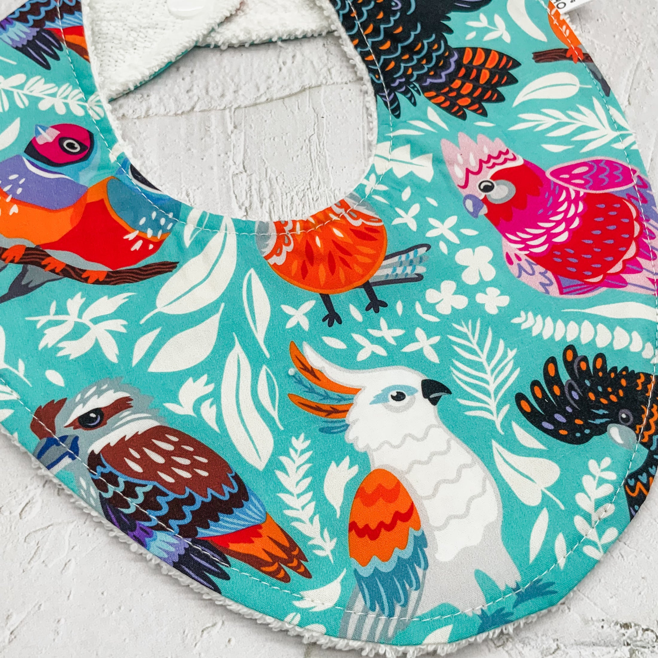 Aussie Birds Teal Signature Bib