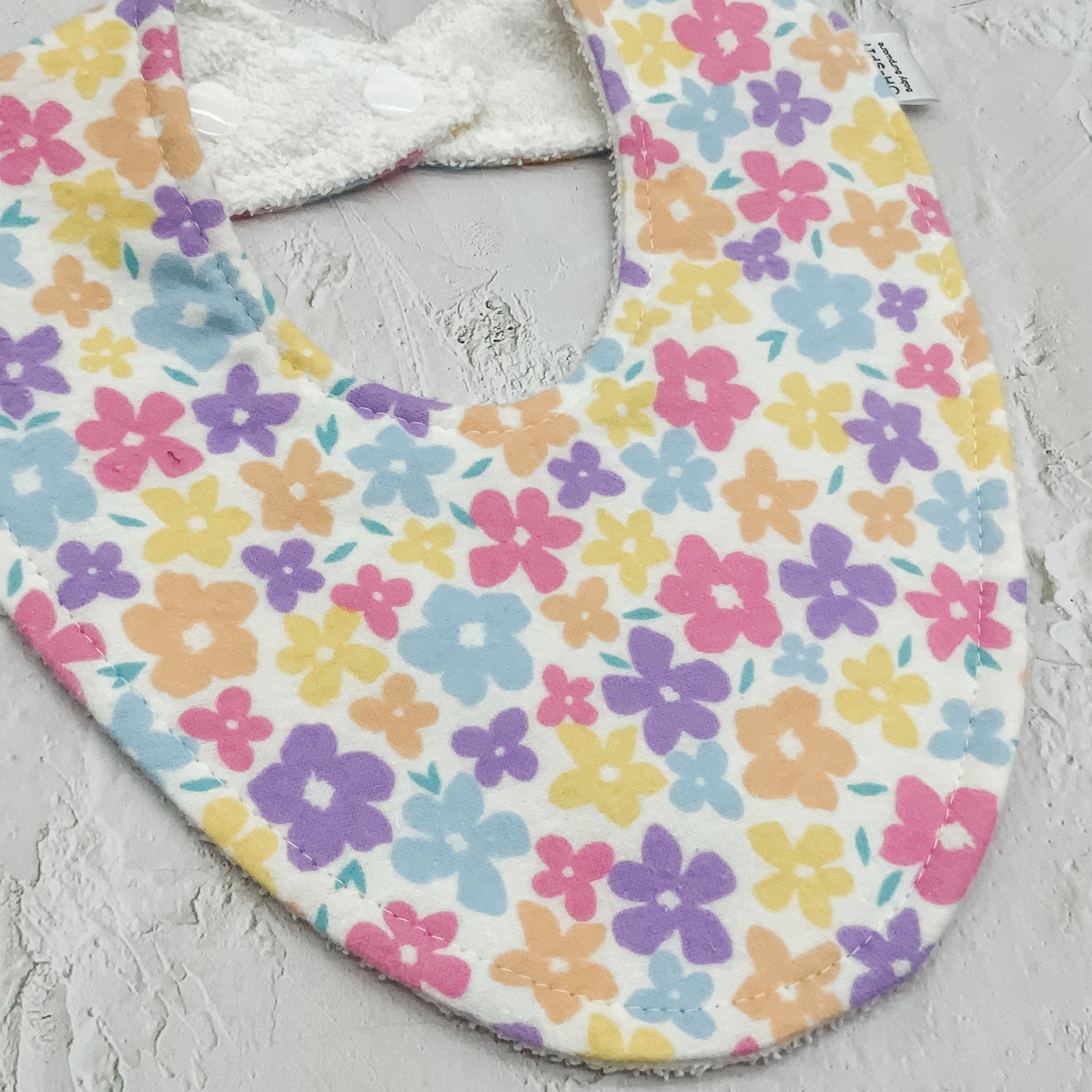 Soft Flowery Signature Bib