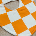 Load image into Gallery viewer, Mandarin Orange Checkerboard Bib
