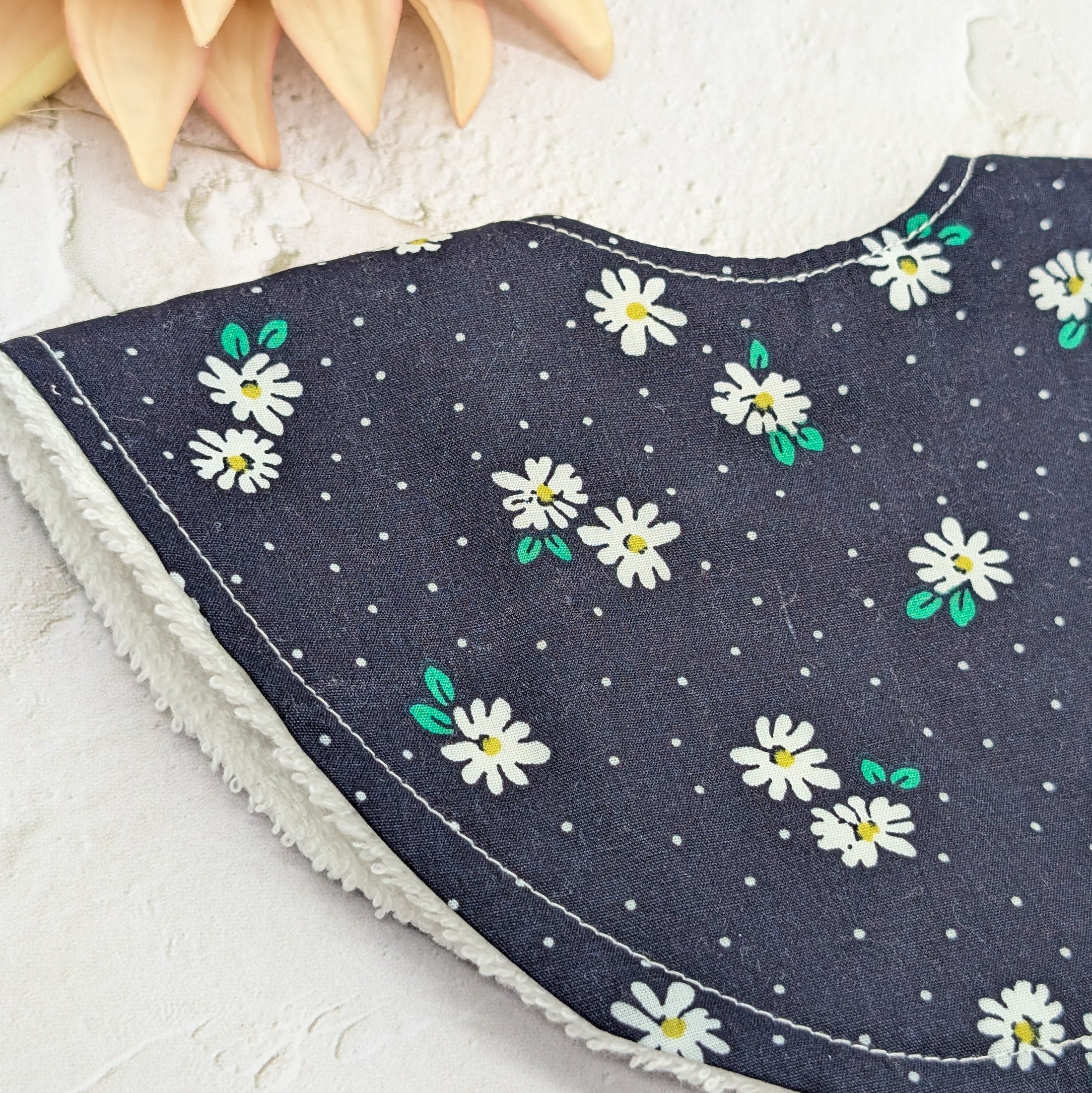 Navy Daisies Dribble Bib