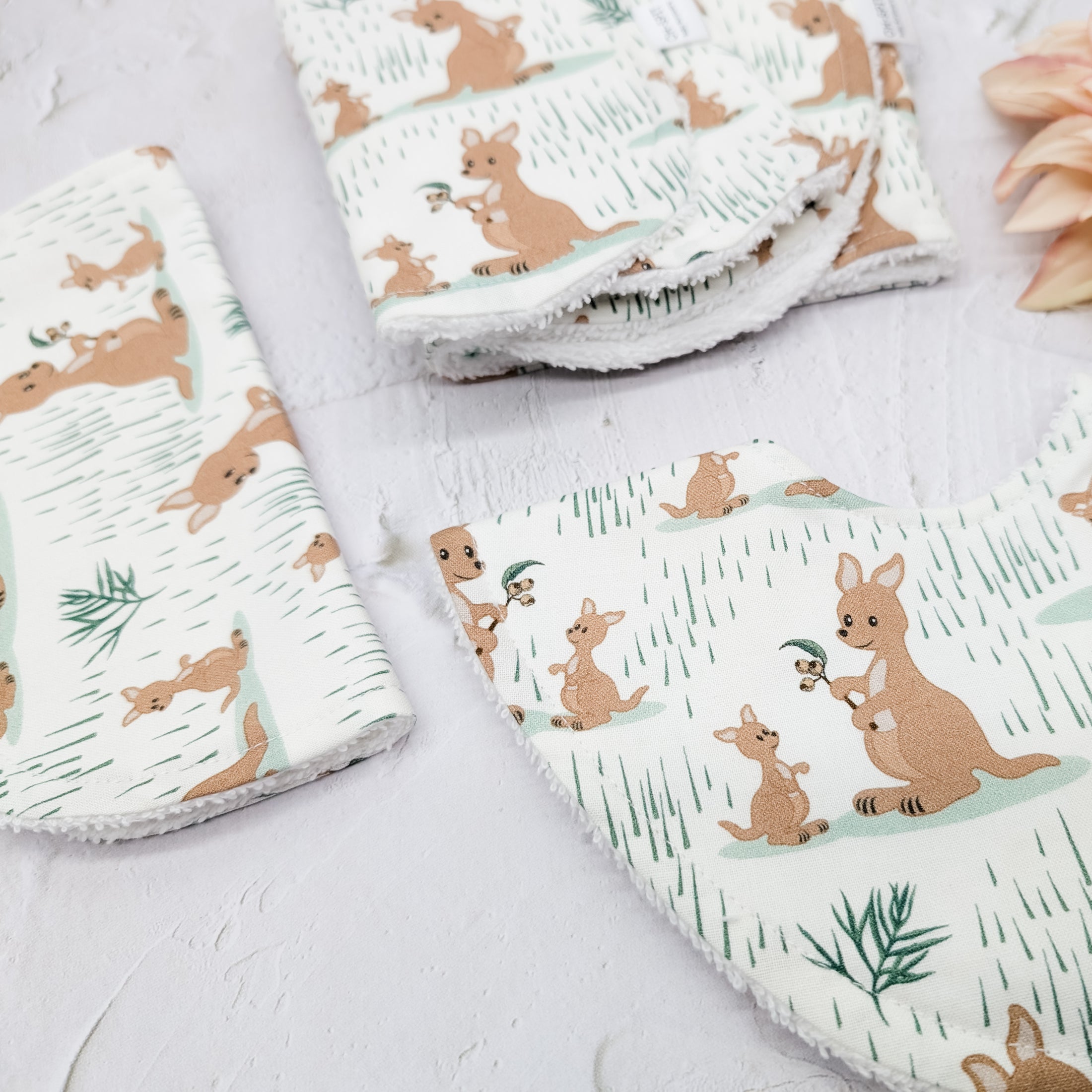 Australian Kangaroo Baby Bib and Burp Cloth Set – A soft and absorbent baby essentials set featuring an adorable kangaroo and joey print. Handmade in Australia with high-quality cotton and towelling for comfort and practicality.